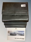 Three Porsche Driver's Manuals/Owner Booklets in Original Black Wallets : 911 Carrera,