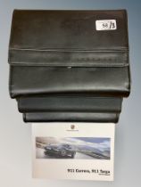 Three Porsche Driver's Manuals/Owner Booklets in Original Black Wallets : 911 Carrera,