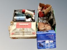 Two crates of travel flasks, camping burner and grill, axle stands,