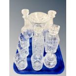 Four crystal decanters, flower vase,