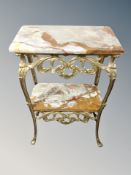 An onyx and gilt metal two tier side table,