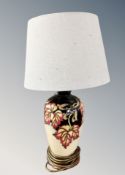 A Moorcroft table lamp with shade,