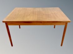 A Scandinavian teak extending dining table,