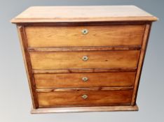 A 19th century stained pine chest of four drawers width 108 cm