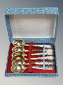 A set of Indian enamel coffee spoons