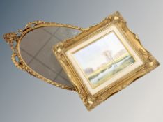 A contemporary gilt oval mirror together with a gilt framed oil on canvas- landscape signed Morris