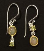 A pair of Ethiopian opal gemstone earrings, on sterling silver with multi tone gold plating,