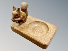 Squirrelman : A Trevor Hutchinson English oak ashtray, 9 cm x 13.