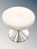 A 20th century white vinyl footstool