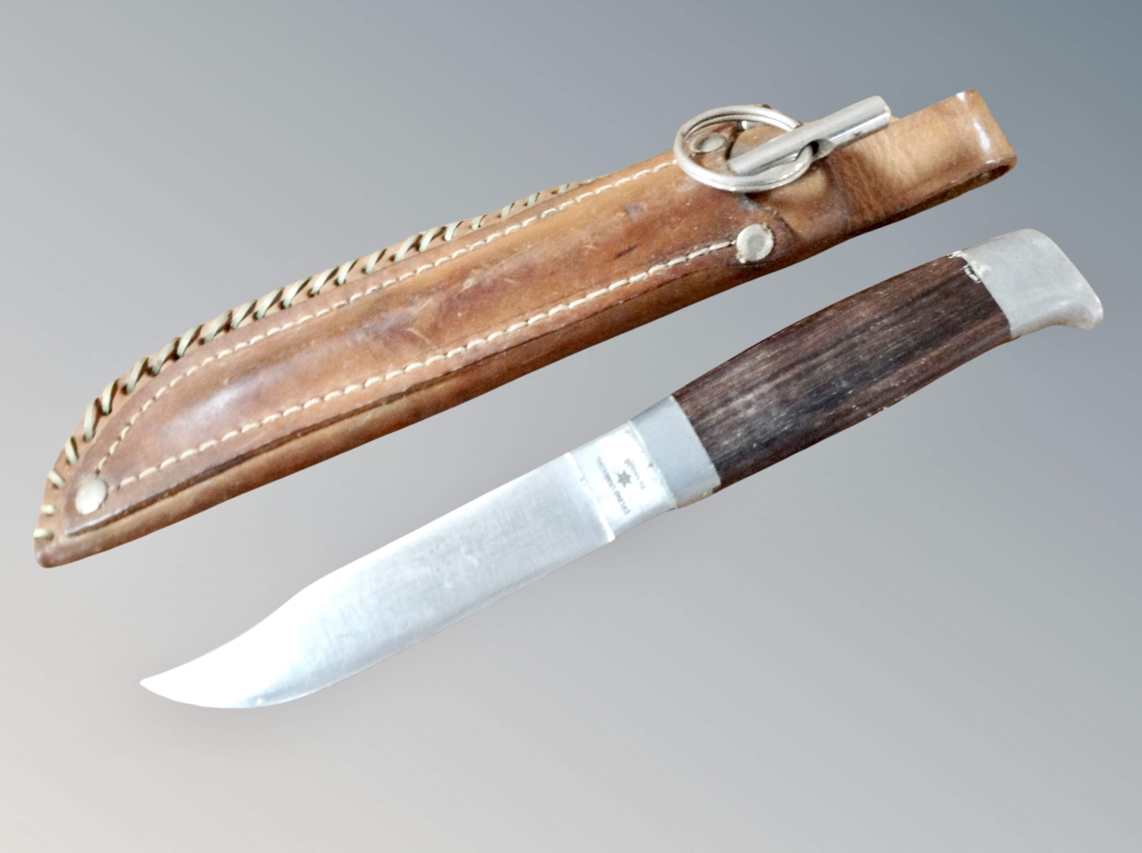 An Erling Vangadal Danish hunting knife in leather sheath