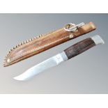 An Erling Vangadal Danish hunting knife in leather sheath