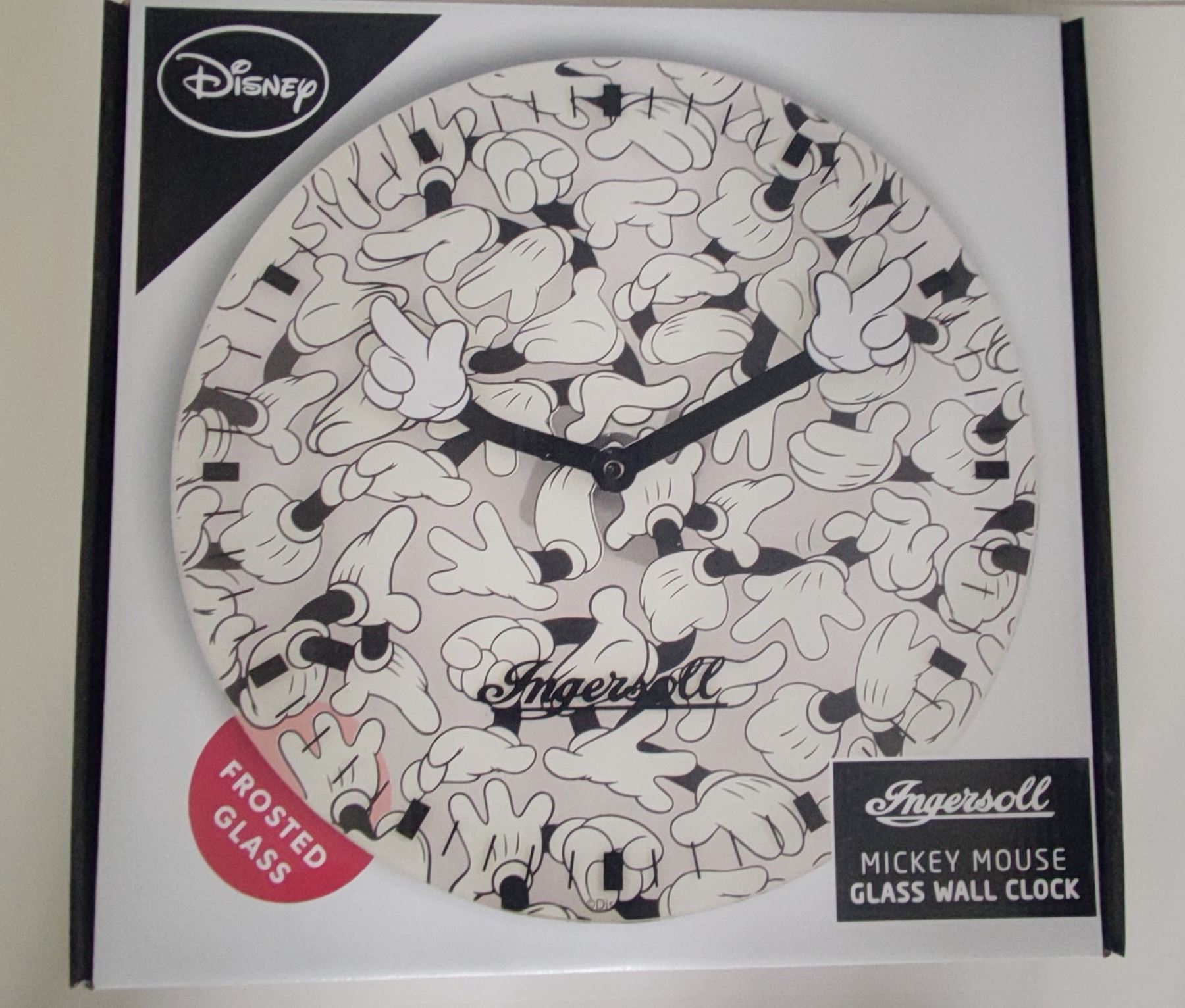 A brand new Disney Ingersoll Mickey Mouse wall clock, width 12 inches.