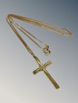 A 9ct yellow gold necklace with yellow gold crucifix pendant CONDITION REPORT: 5g