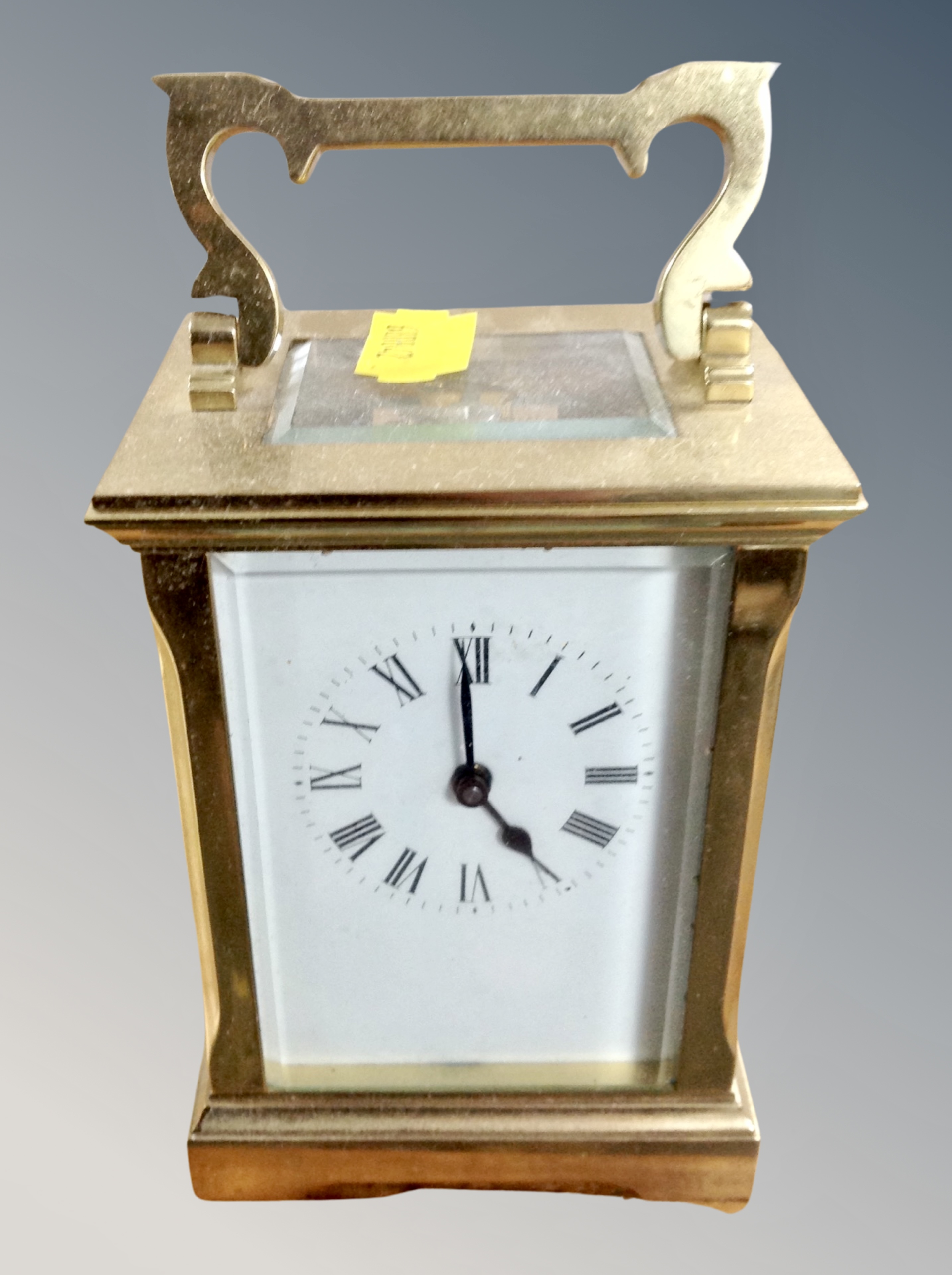 A brass cased carriage timepiece,