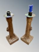 Mouseman : A pair of Robert Thompson English oak candlesticks with pewter drip pans, height 29.