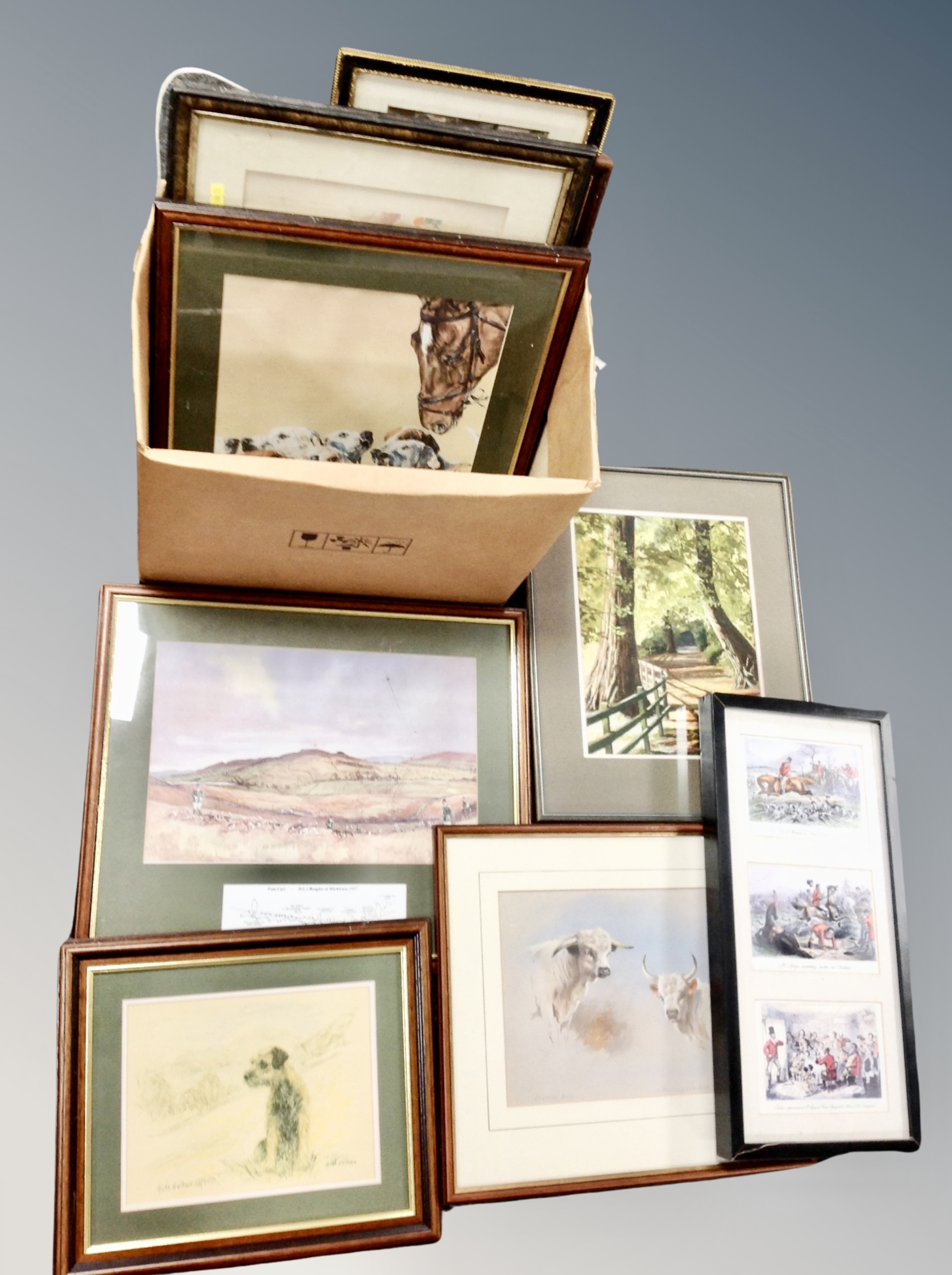 A box of antique and later pictures and prints,