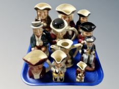 A tray of eleven assorted Tony Wood character jugs