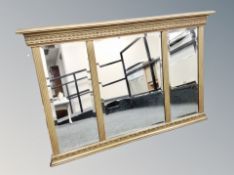 A late Victorian gilt framed triple overmantel mirror