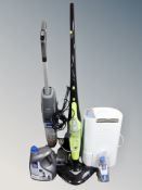 A Vax Onepwr cordless carpet cleaner with solution together with Thane H20 floor steamer and