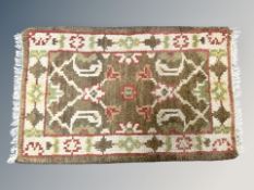 A small eastern hearth rug,