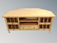 A contemporary oak oversized television stand,