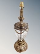 A contemporary brass and cut glass table lamp