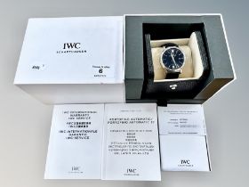 A gent's stainless steel IWC Schaffhausen Portofino automatic calendar centre seconds wristwatch,