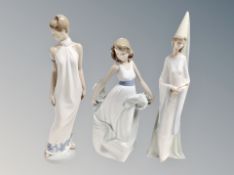 Three large Nao figures,