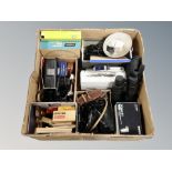 A box of vintage photographic equipment, cameras,
