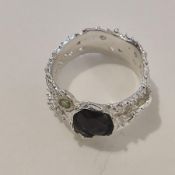 Ethiopian black opal sterling silver white gold plated ring with cubic zirconas. Size Q.