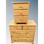 A contemporary pine five drawer chest and similar three drawer bedside chest