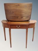 An Ercol elm and beech flap sided coffee table in antique finish, width 69 cm,