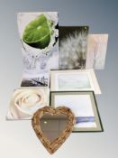 A driftwood heart shaped mirror together with seven assorted prints and canvases