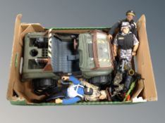 An Action Man army jeep together with four Action Man figures with clothes and accessories