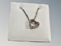 A 9ct white gold diamond heart pendant