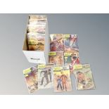 A box of Classics Illustrated comics to include The Three Musketeers, Frankenstein,