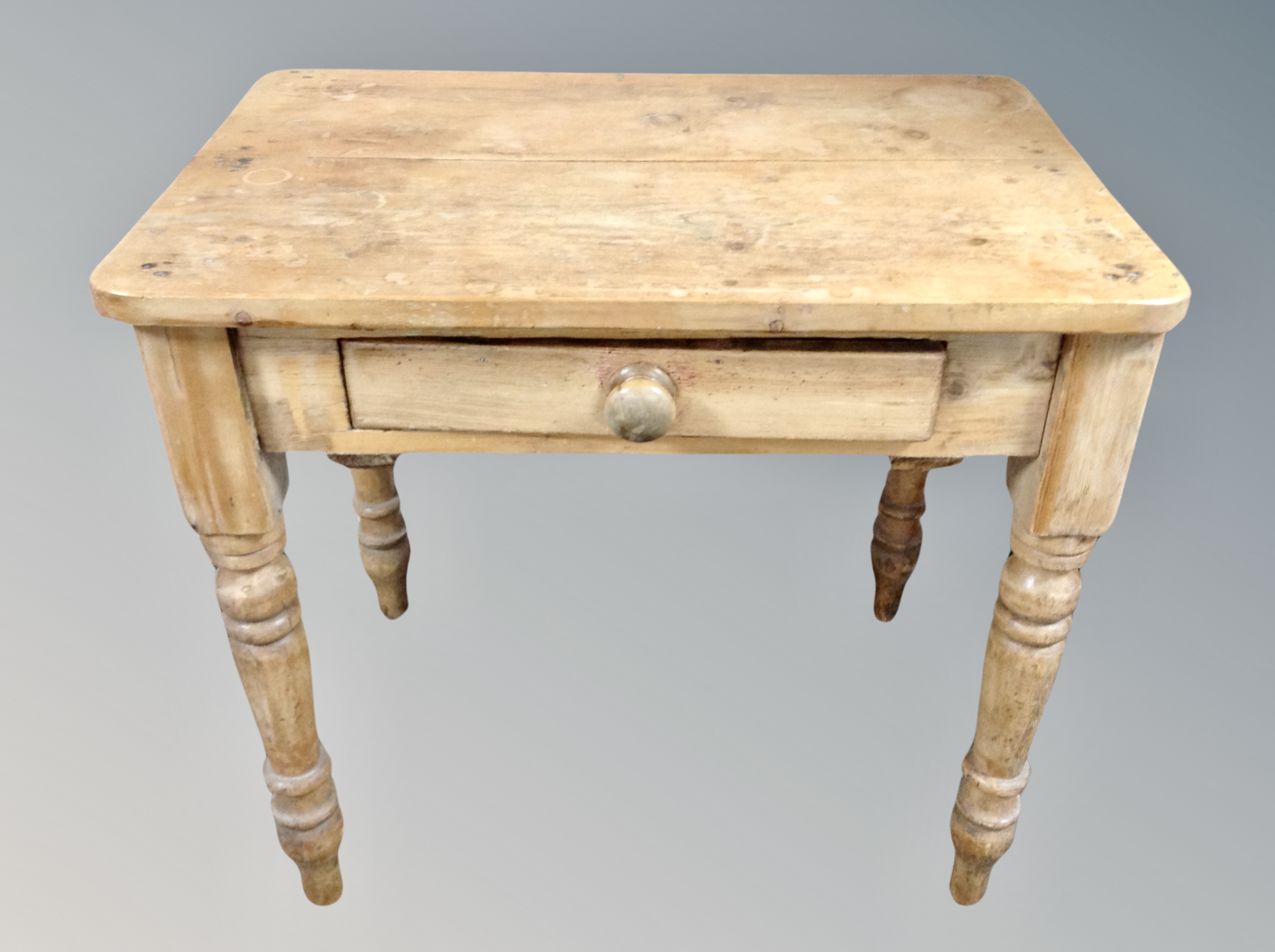 A Victorian pine side table fitted a drawer