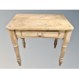 A Victorian pine side table fitted a drawer