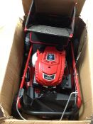An Einhell low emission series air cooling system self drive petrol lawn mower in box, as new.