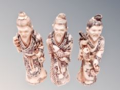 Three Chinese carved resin figures