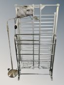 A folding heated clothes airer and chrome towel rail,
