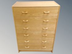 A teak effect six drawer chest