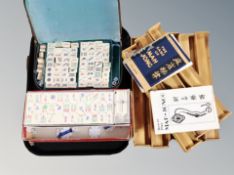 Two Mahjong sets in box and case,