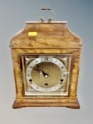 A walnut cased eight day lever Westminster and Whittington chime mantel clock with key,