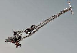 A small silver chain with T-bar,