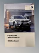 Ten BMW Driver's Manuals/Owner Booklets in Original Wallets : X1 and 1-Series.