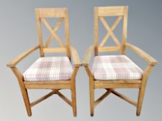 A pair of contemporary oak armchairs
