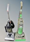 A Dyson DC4 vacuum together with a Hoover pets vacuum