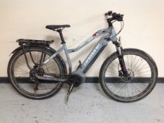A Haibike trekking SDROUS electric front suspension mountain bike with rear pannier (no key or