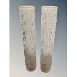 A pair of tall glass vases with bark effect finish, from Helsinki, 30.